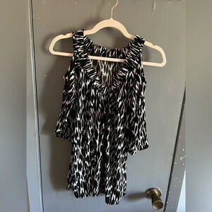 Cold shoulder black and white top All tags are missing no size/ brand/ material